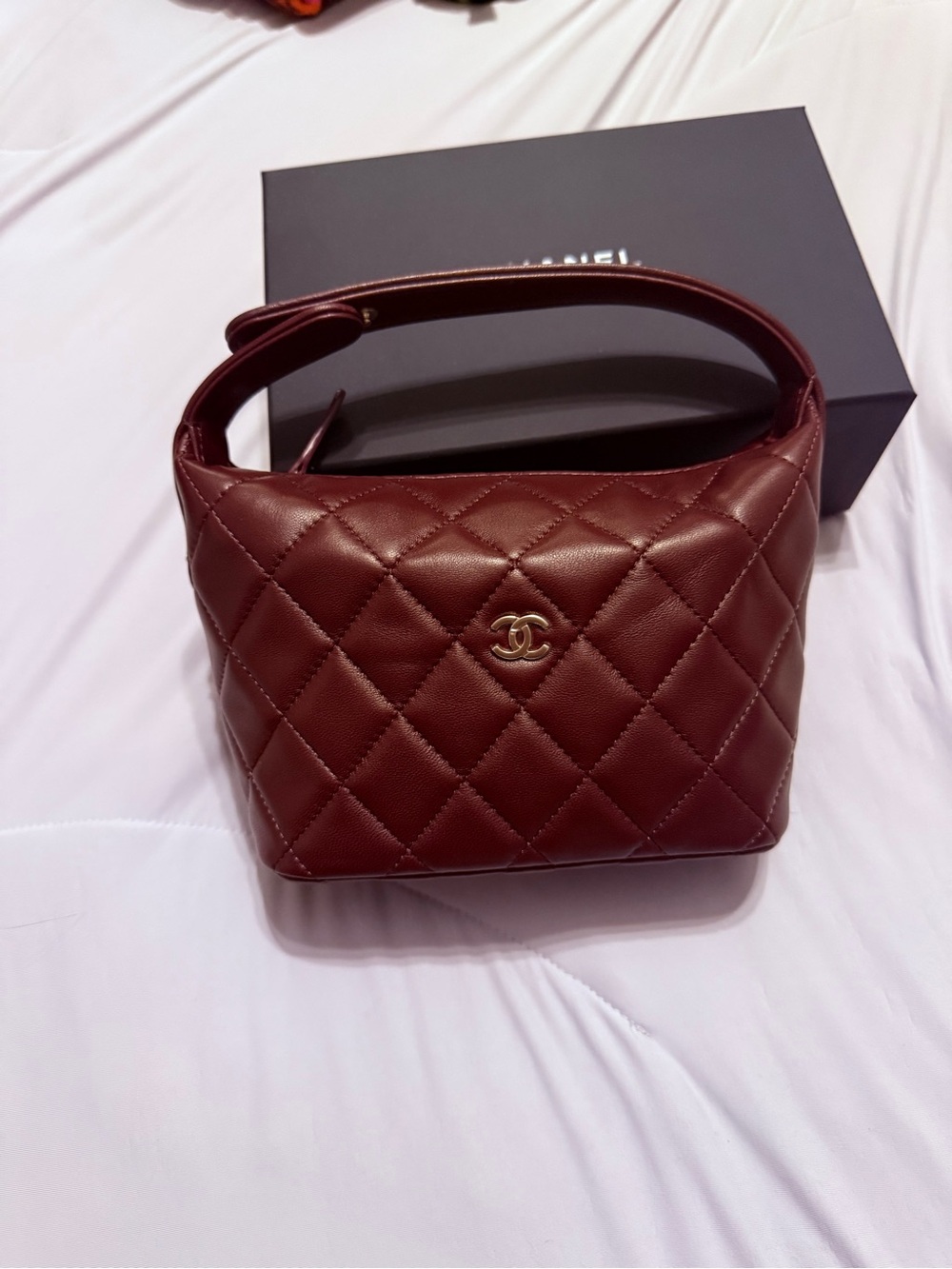 CHANEL Quilted Leather Classic Clutch in Deep Burgundy with Gold Hardware